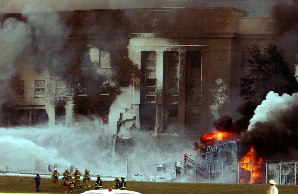 The Pentagon in flames moments after being struck on September 11, 2001